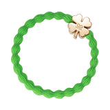gold clover leaf apple green